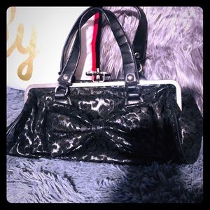 🎀👜Adorable rock rebel bow purse💕